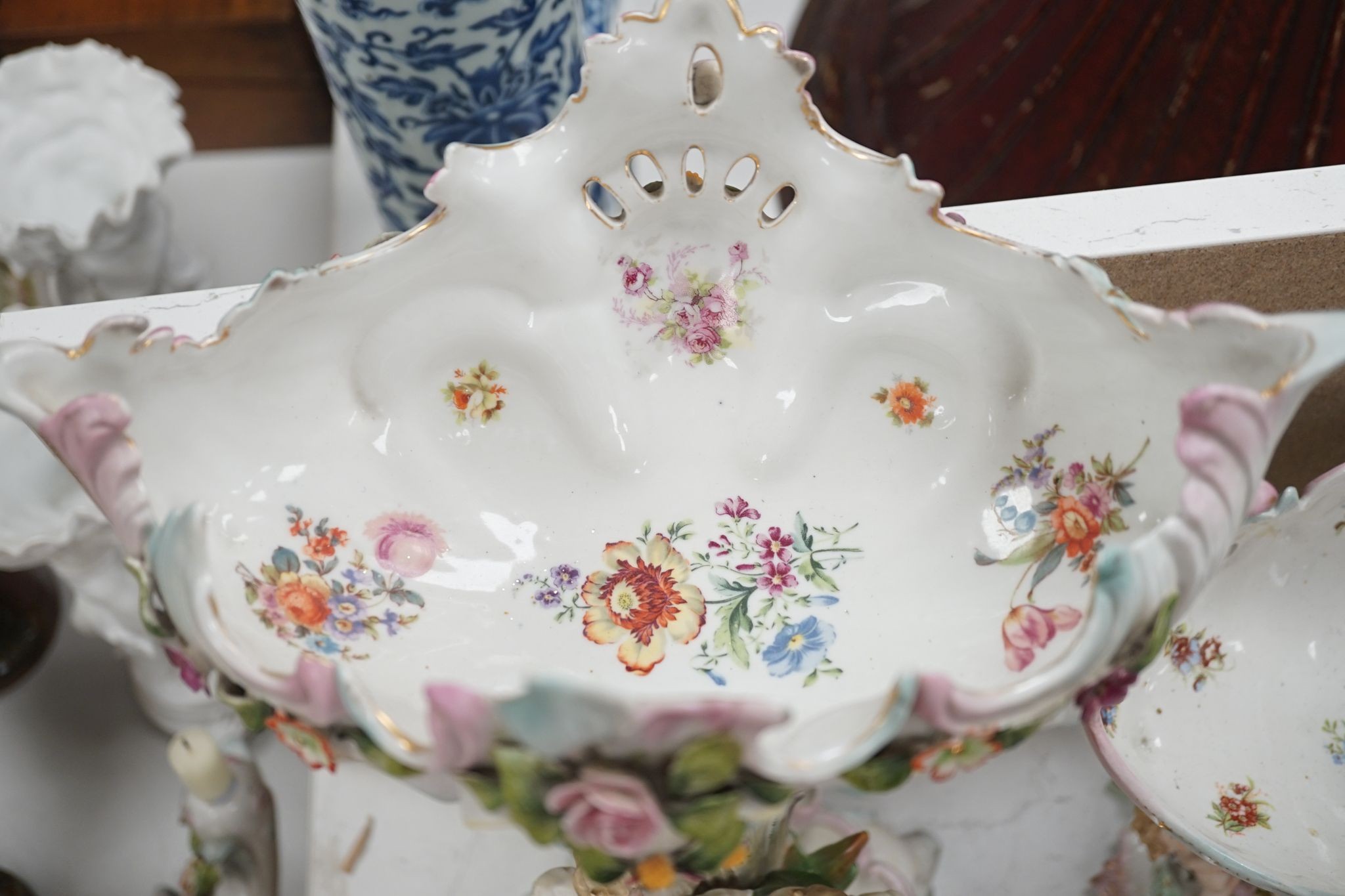 A tall German porcelain figural centrepiece bowl and two others smaller. Tallest 47cm